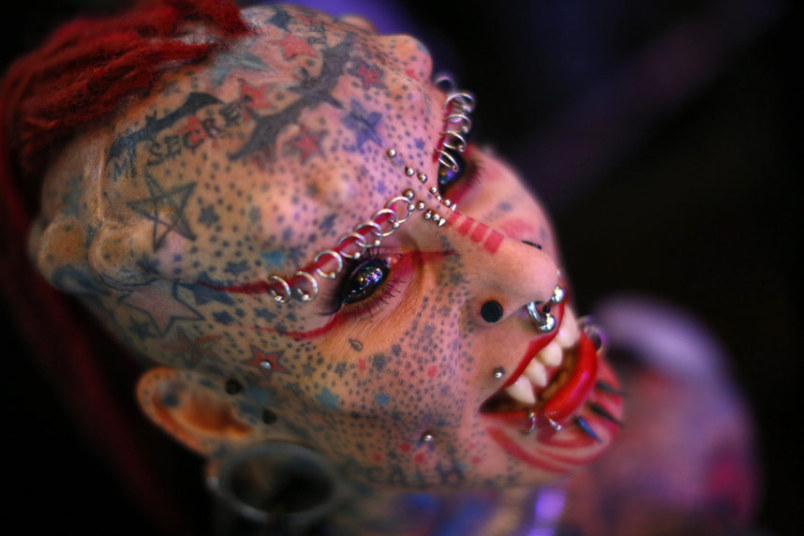 Psychopaths don't look dangerous. They blend in so they can take advantage of people's ignorance. Photo of extreme tattoos and piercings.